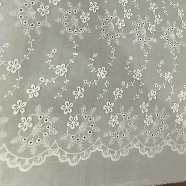 Ang burda ng tela ng eyelet na may burol