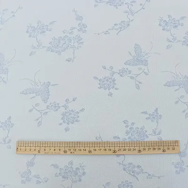 Naka -texture na nakataas na emboss makulay na radial cationic jacquard na tela para sa mga damit